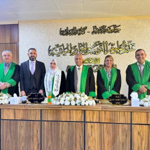 A faculty member from the College of Agriculture serves as a member of the thesis defense committee at the University of Anbar.